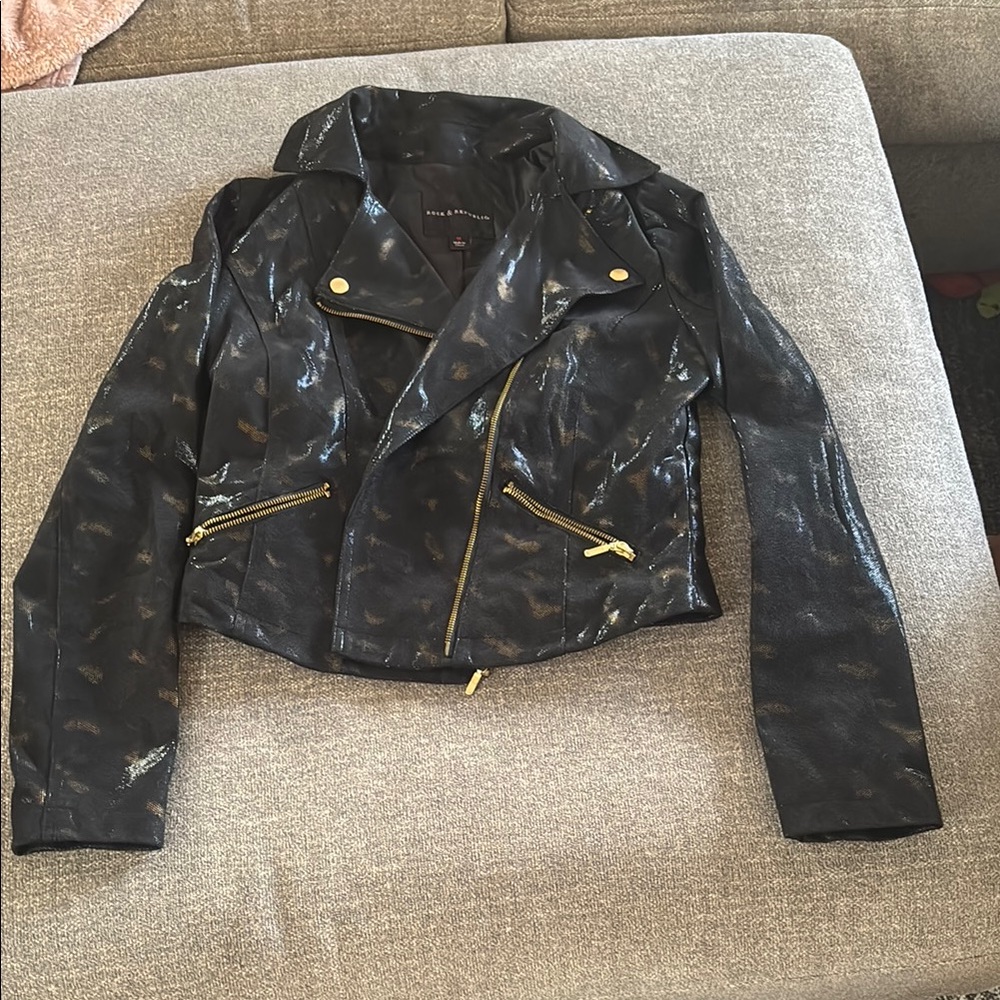 Black Leather Jacket with Gold Accents